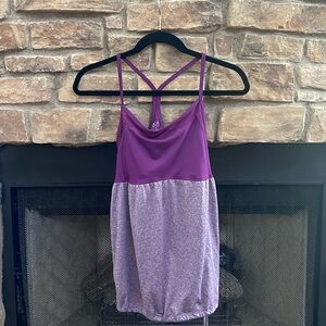Champion purple lined sports top w/ bottom drawstring, criss cross back. Large
